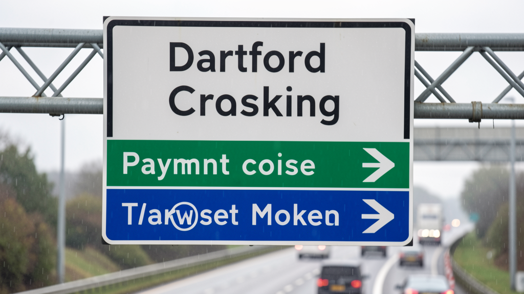 Road sign showing Dartford Crossing charges and payment information on a UK motorway